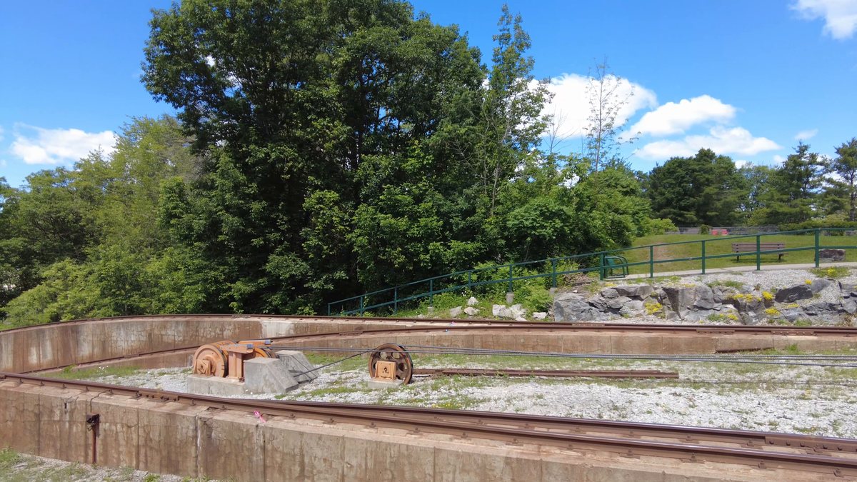 Disused rail bed and cast-iron rollers at the Big Chute lockstation, Severn River